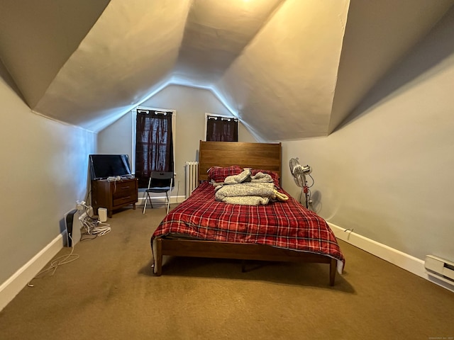 carpeted bedroom featuring vaulted ceiling, baseboards, and a baseboard radiator