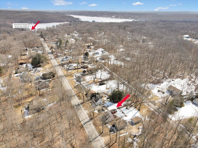 bird's eye view with a water view