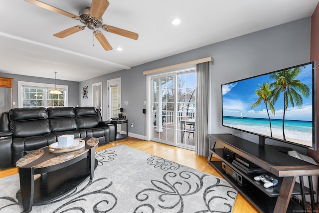 living area featuring recessed lighting, light wood-type flooring, baseboards, and ceiling fan