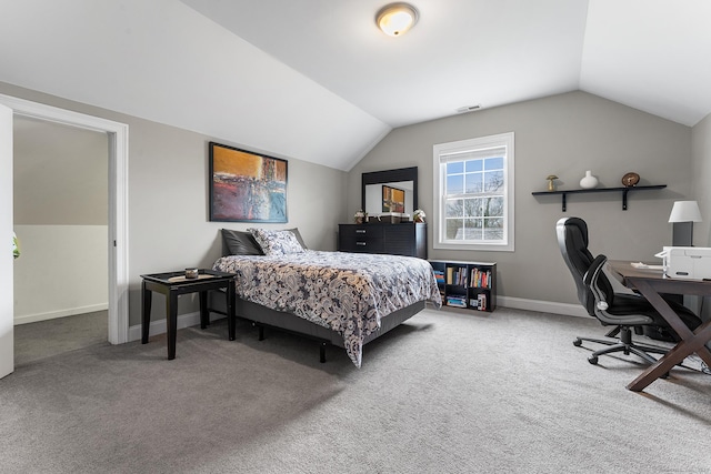 carpeted bedroom featuring vaulted ceiling, visible vents, and baseboards