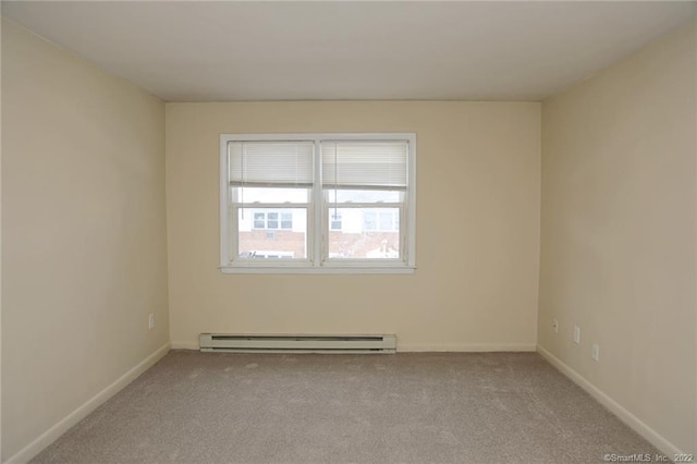17 Fordyce Ct Apt 2, New Milford, CT 06776 - empty room featuring baseboard heating, baseboards, and carpet
