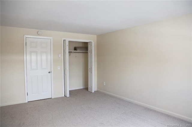 17 Fordyce Ct Apt 2, New Milford, CT 06776 - unfurnished bedroom with a closet, carpet flooring, and baseboards