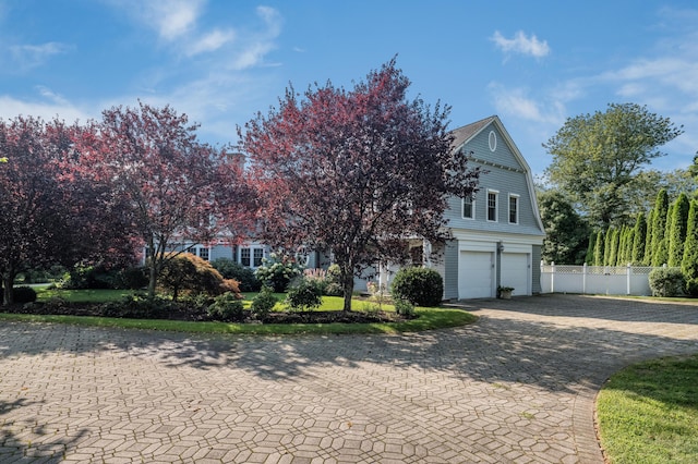 3 Sea Meadows Ln, Waterford, CT 06385 - view of front of house featuring decorative driveway and an attached garage