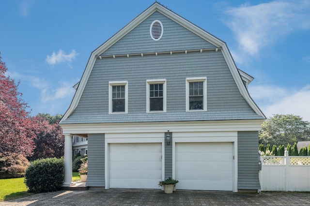 3 Sea Meadows Ln, Waterford, CT 06385 - view of side of home featuring a gambrel roof and a garage