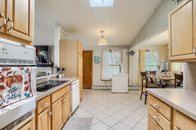 kitchen featuring white appliances, a baseboard heating unit, light countertops, and light brown cabinetry