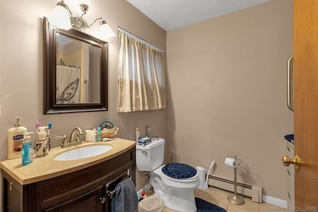 bathroom with a baseboard radiator, toilet, vanity, baseboards, and tile patterned floors