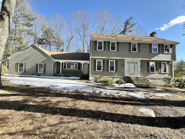 colonial home with a chimney