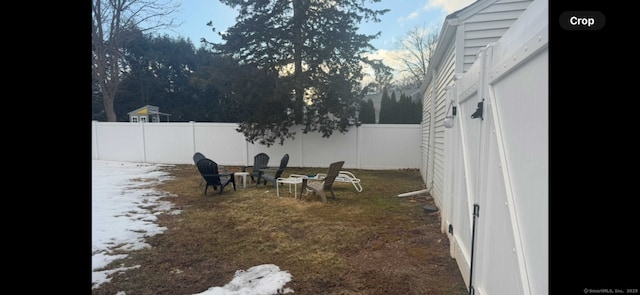 view of yard with a fenced backyard