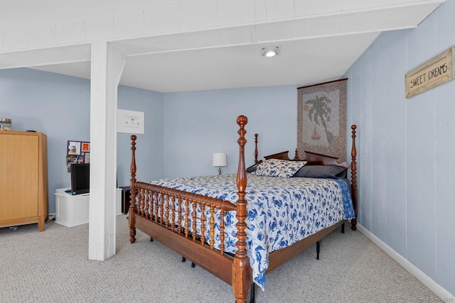 carpeted bedroom with baseboards