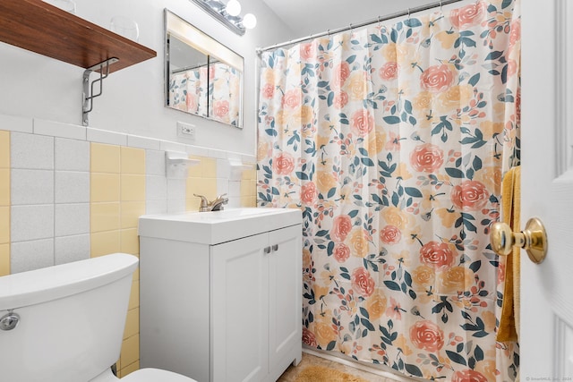 full bathroom featuring vanity, toilet, tile walls, and a shower with curtain