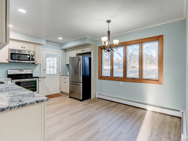 kitchen with ornamental molding, light stone counters, white cabinetry, appliances with stainless steel finishes, and baseboard heating