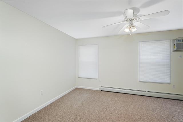 spare room featuring a ceiling fan, a wall unit AC, carpet, baseboards, and baseboard heating