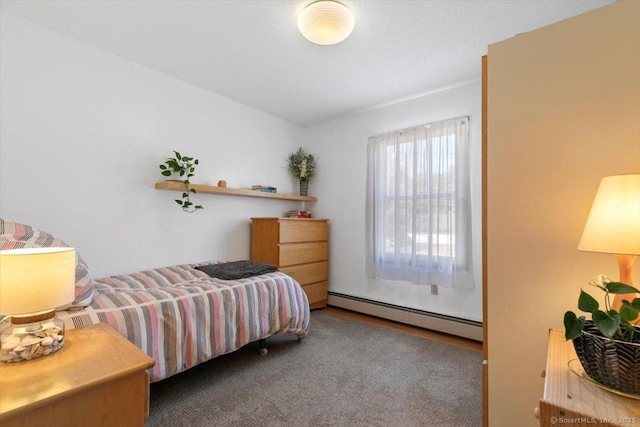 bedroom with a baseboard radiator