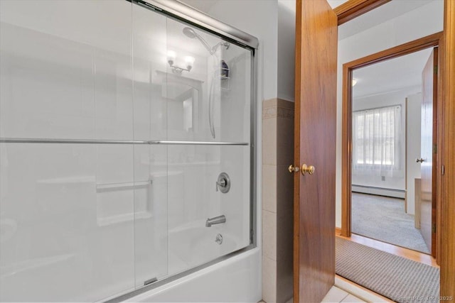 full bath featuring enclosed tub / shower combo and baseboard heating