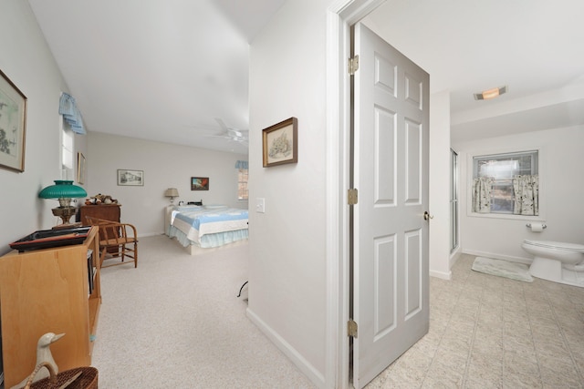 bedroom with visible vents, carpet, and baseboards