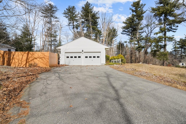 garage with fence