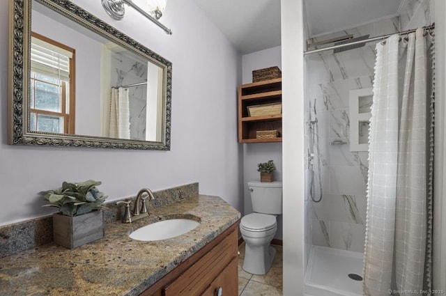 full bath featuring toilet, a stall shower, vanity, and tile patterned flooring