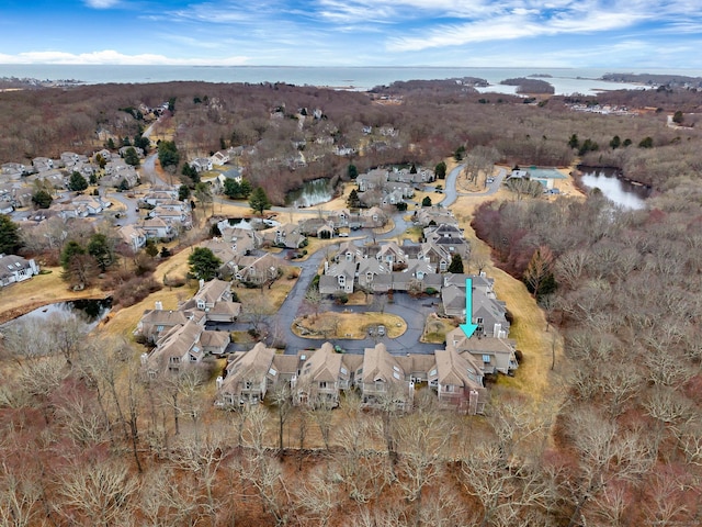 aerial view featuring a residential view and a water view