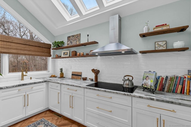 kitchen featuring open shelves, white cabinets, a sink, island range hood, and black electric cooktop