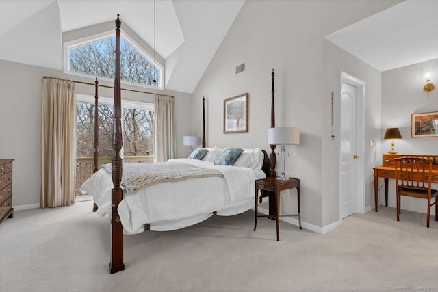 bedroom with carpet floors, high vaulted ceiling, baseboards, and visible vents