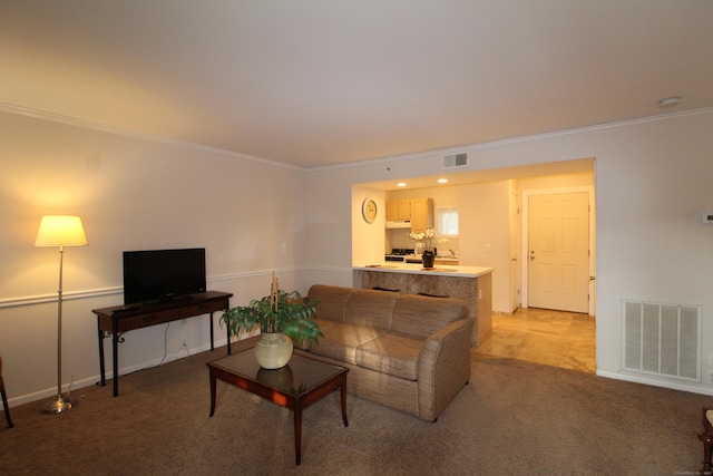 living area with light carpet, ornamental molding, visible vents, and baseboards