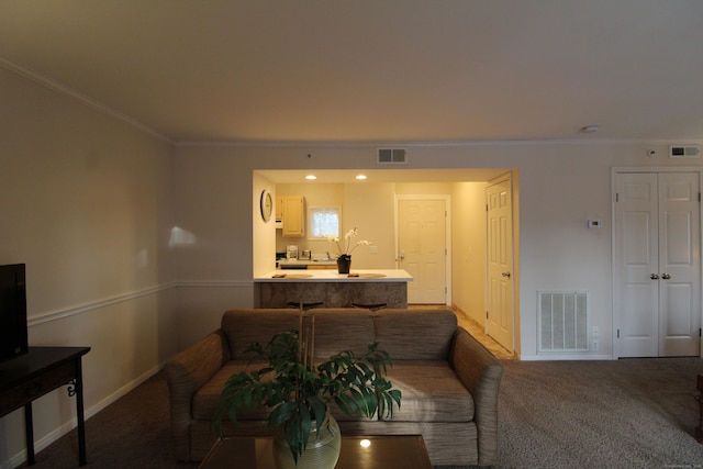 living room featuring ornamental molding, carpet, and visible vents