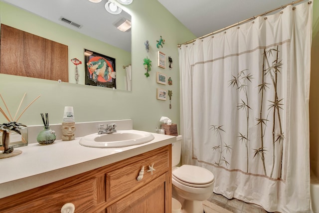 bathroom with visible vents, vanity, toilet, and a shower with curtain