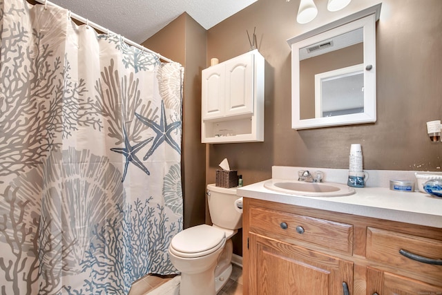 full bath featuring a textured ceiling, toilet, visible vents, vanity, and a shower with curtain