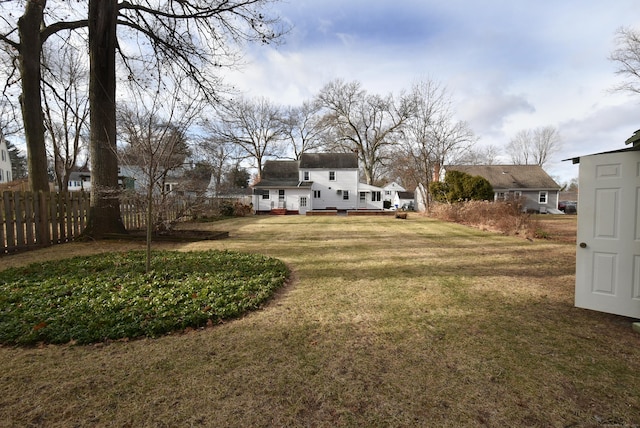 view of yard featuring fence