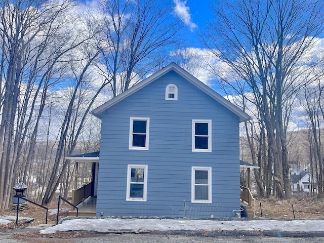 view of snow covered property