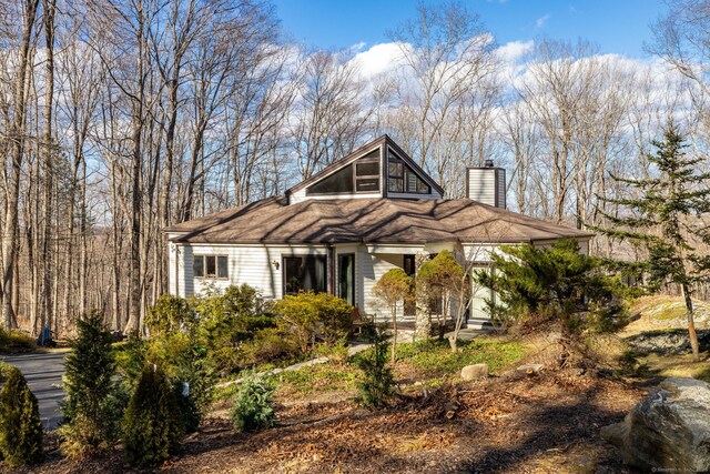 view of front of home with a chimney