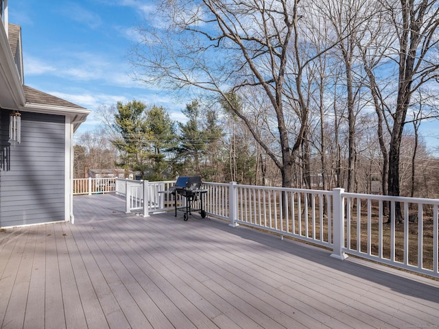 wooden deck with area for grilling