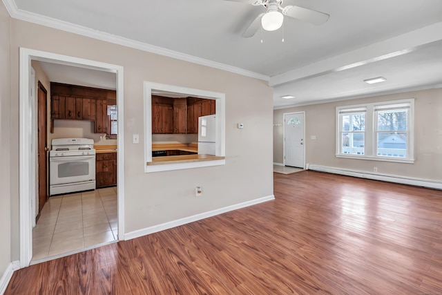 kitchen with light wood-type flooring, white appliances, crown molding, a baseboard radiator, and baseboards