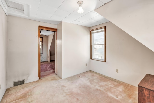 bonus room with visible vents and carpet floors