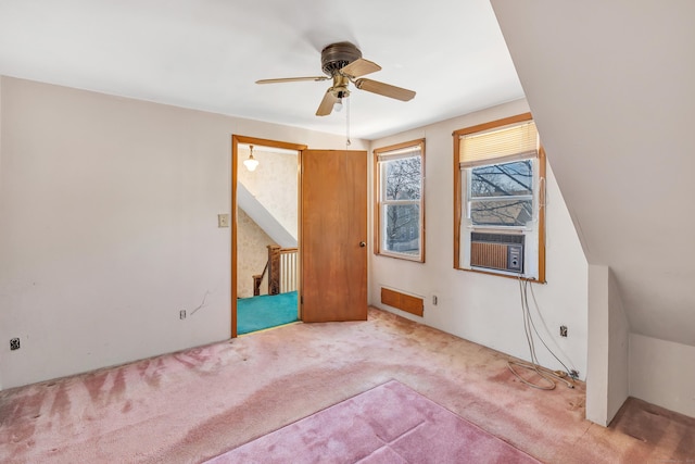 unfurnished bedroom with a ceiling fan and carpet floors