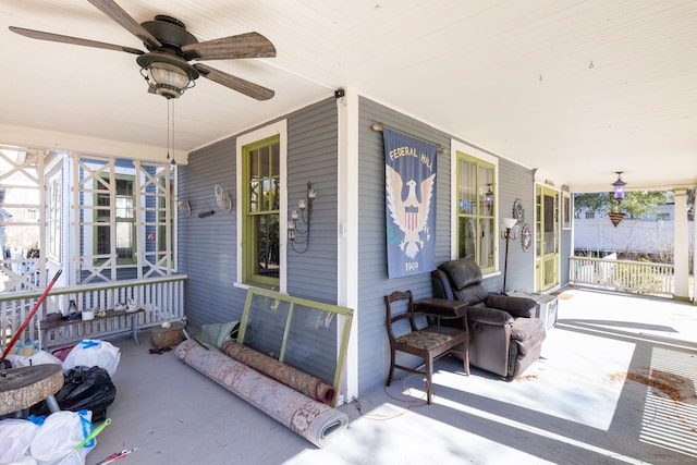 view of patio with a porch and a ceiling fan