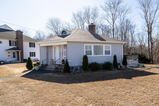 view of front of property featuring a chimney