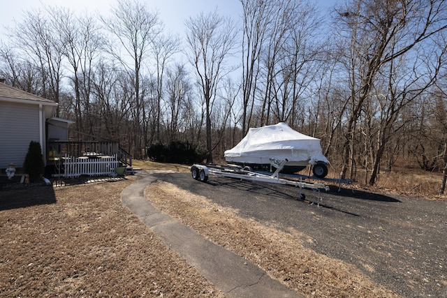 view of yard featuring a wooden deck