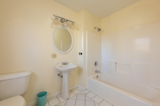 full bathroom featuring baseboards, toilet, shower / bathtub combination, and tile patterned flooring