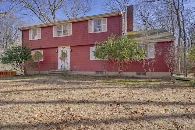 colonial home with a chimney