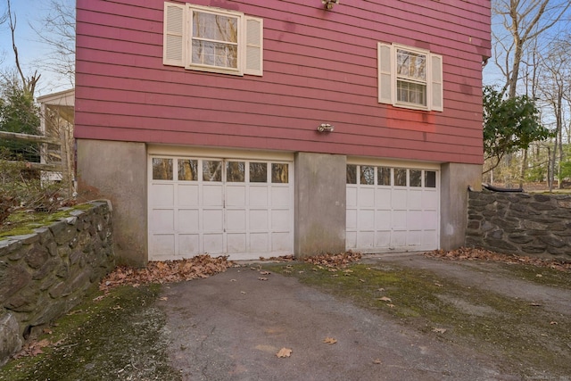 garage with driveway