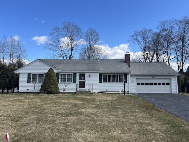 single story home with a front lawn, driveway, entry steps, an attached garage, and a chimney