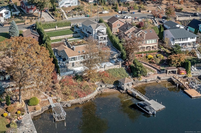 aerial view featuring a water view and a residential view