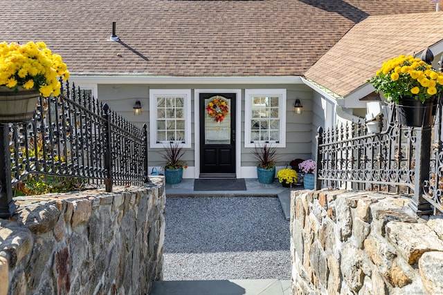 52 S Lake Shore Dr, Brookfield, CT 06804 - view of exterior entry with a shingled roof