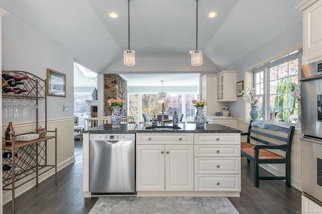 52 S Lake Shore Dr, Brookfield, CT 06804 - kitchen with appliances with stainless steel finishes, a sink, vaulted ceiling, dark wood-type flooring, and a wainscoted wall