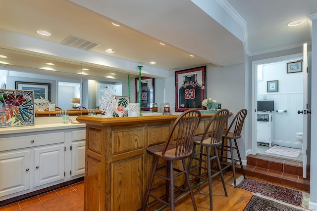 52 S Lake Shore Dr, Brookfield, CT 06804 - indoor bar with ornamental molding, a wainscoted wall, and recessed lighting