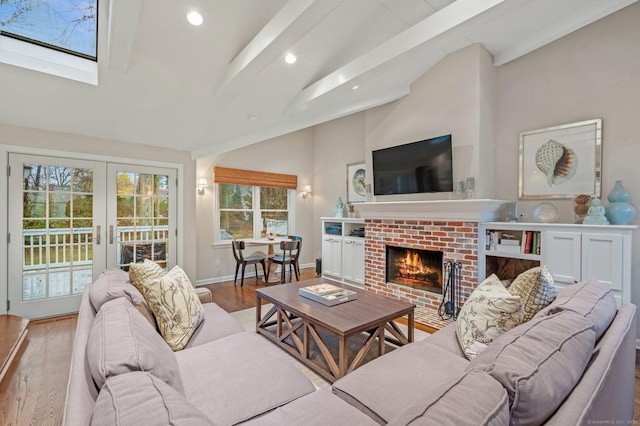 24 Laforge Rd, Darien, CT 06820 - living area featuring a fireplace, french doors, wood finished floors, and recessed lighting