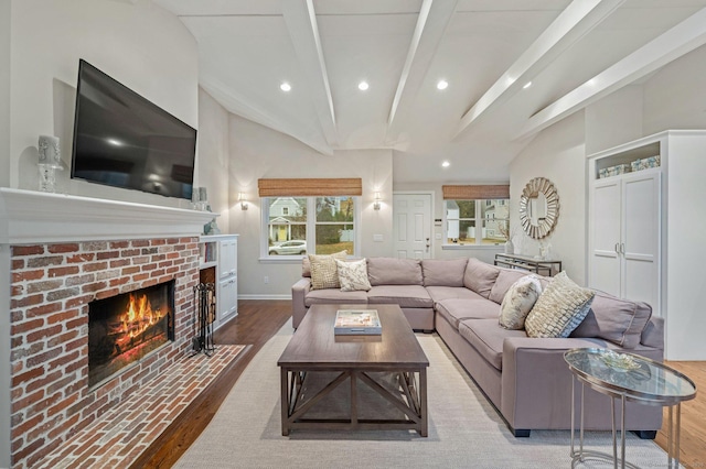 24 Laforge Rd, Darien, CT 06820 - living area featuring a brick fireplace, wood finished floors, and recessed lighting