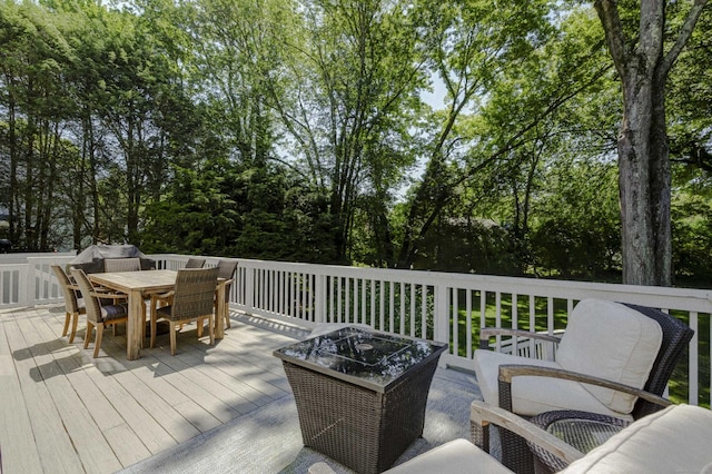 24 Laforge Rd, Darien, CT 06820 - wooden deck with outdoor dining space and view of scattered trees