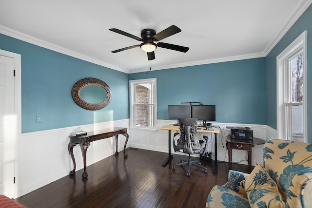 office space with hardwood / wood-style floors, wainscoting, a ceiling fan, and crown molding